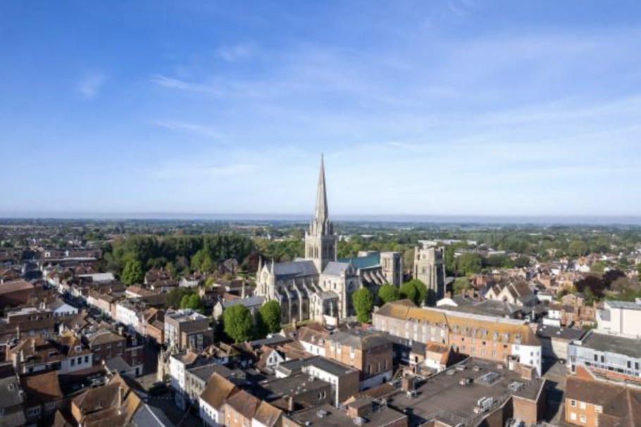Aerial view over Chichester and the cathedral towards the South Downs