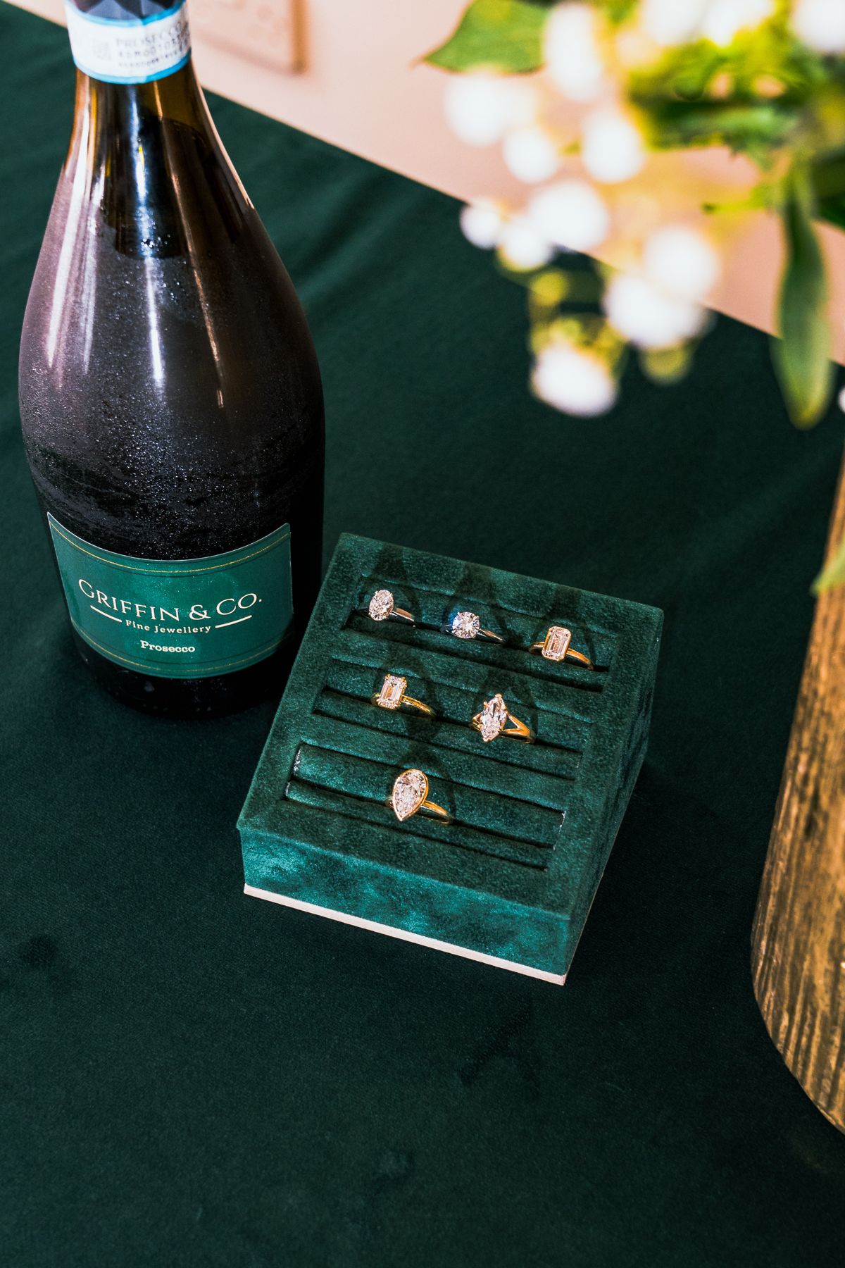 Griffin and Co rings styled with wine