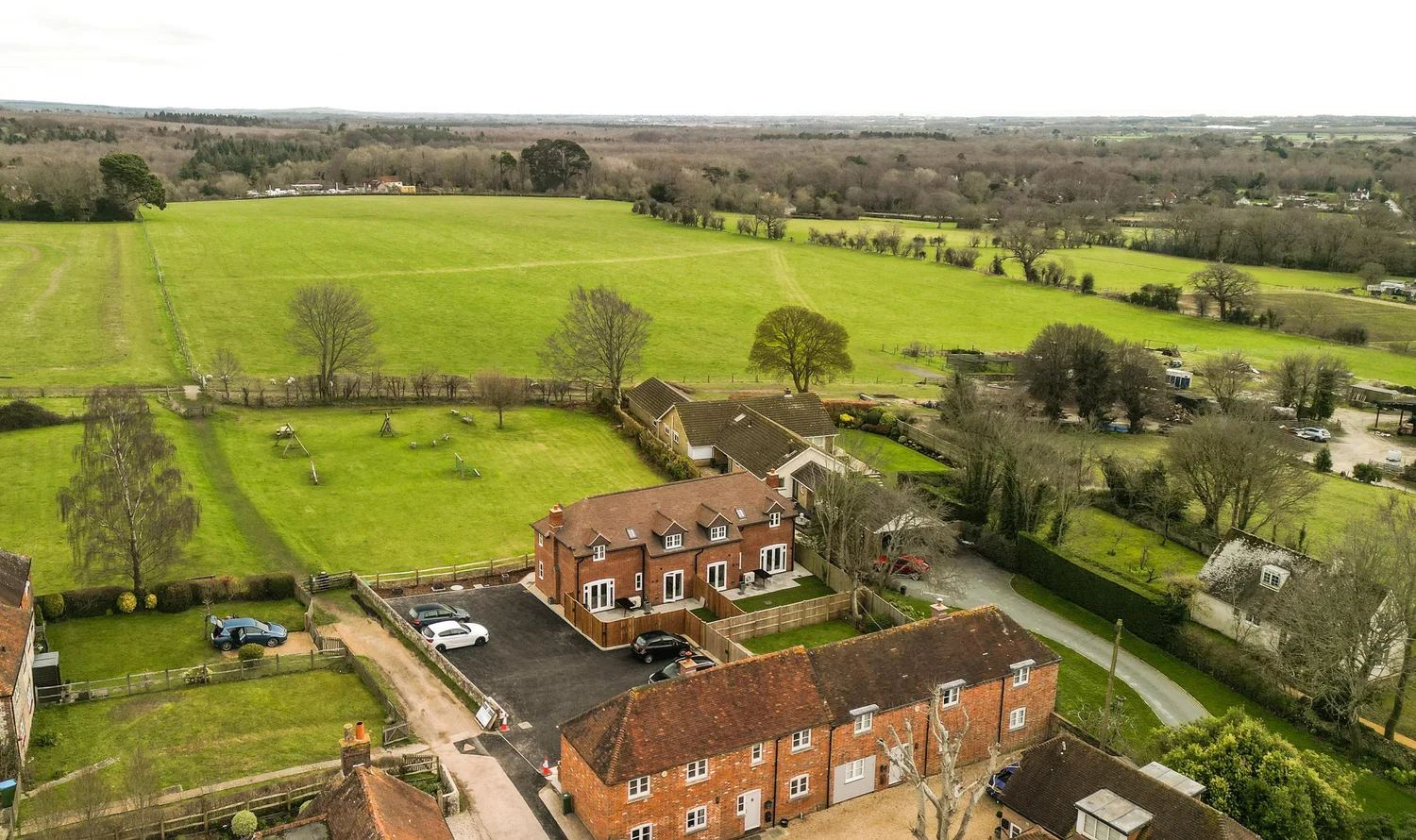 Aerial photo of a farm and countryside near Chichester